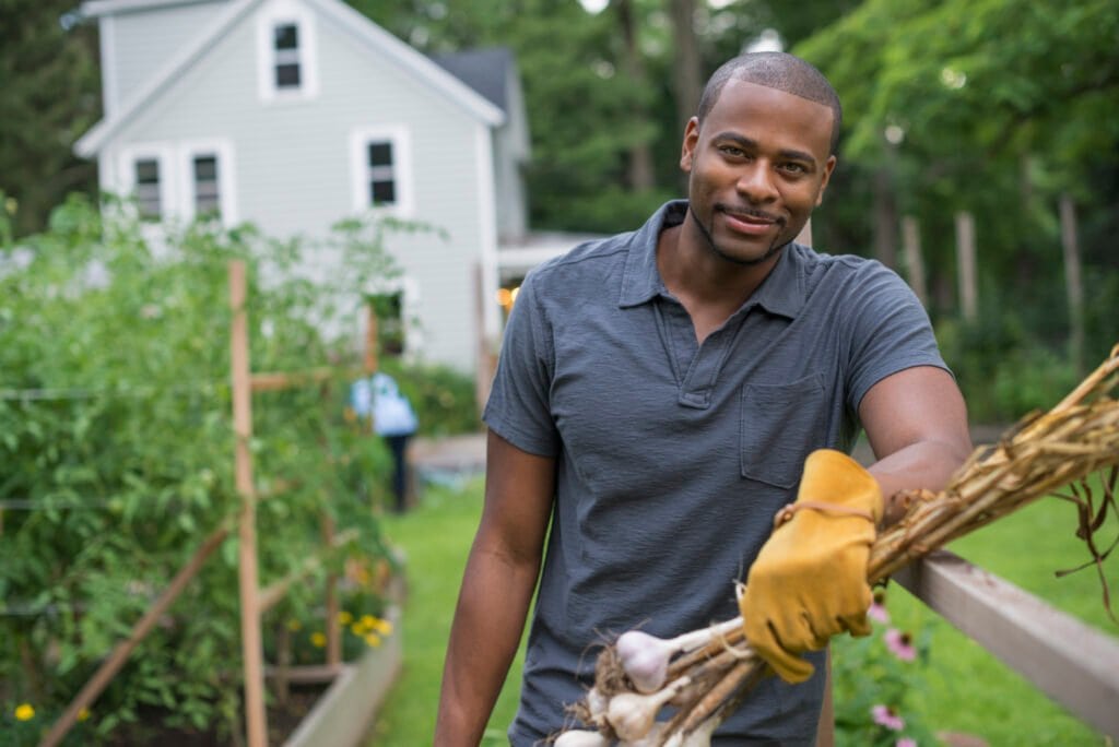 A man gardening full of confidence due to optimal prostate health - Is Saw Palmetto his ally?