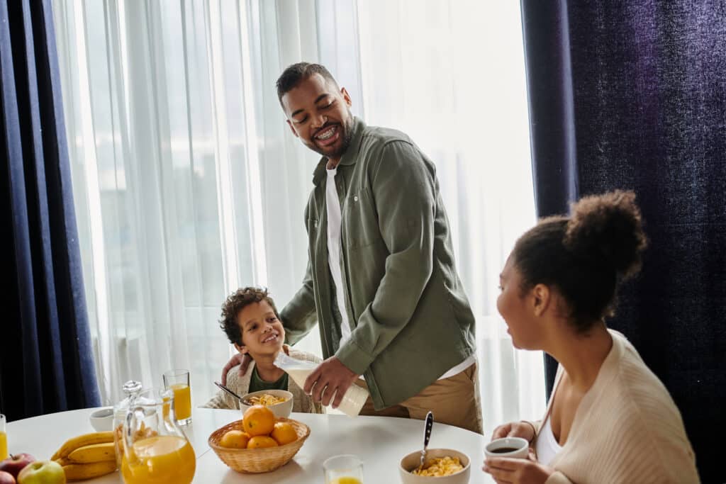 a man's Improved morning mood with family after good night sleep with melatonin